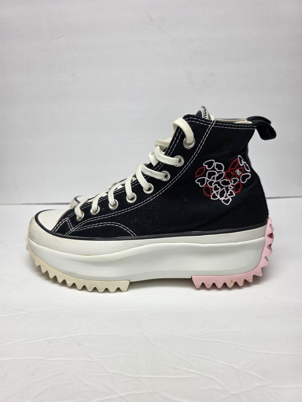Converse Black High-Top Platform Sneaker with Pink Heel Accent